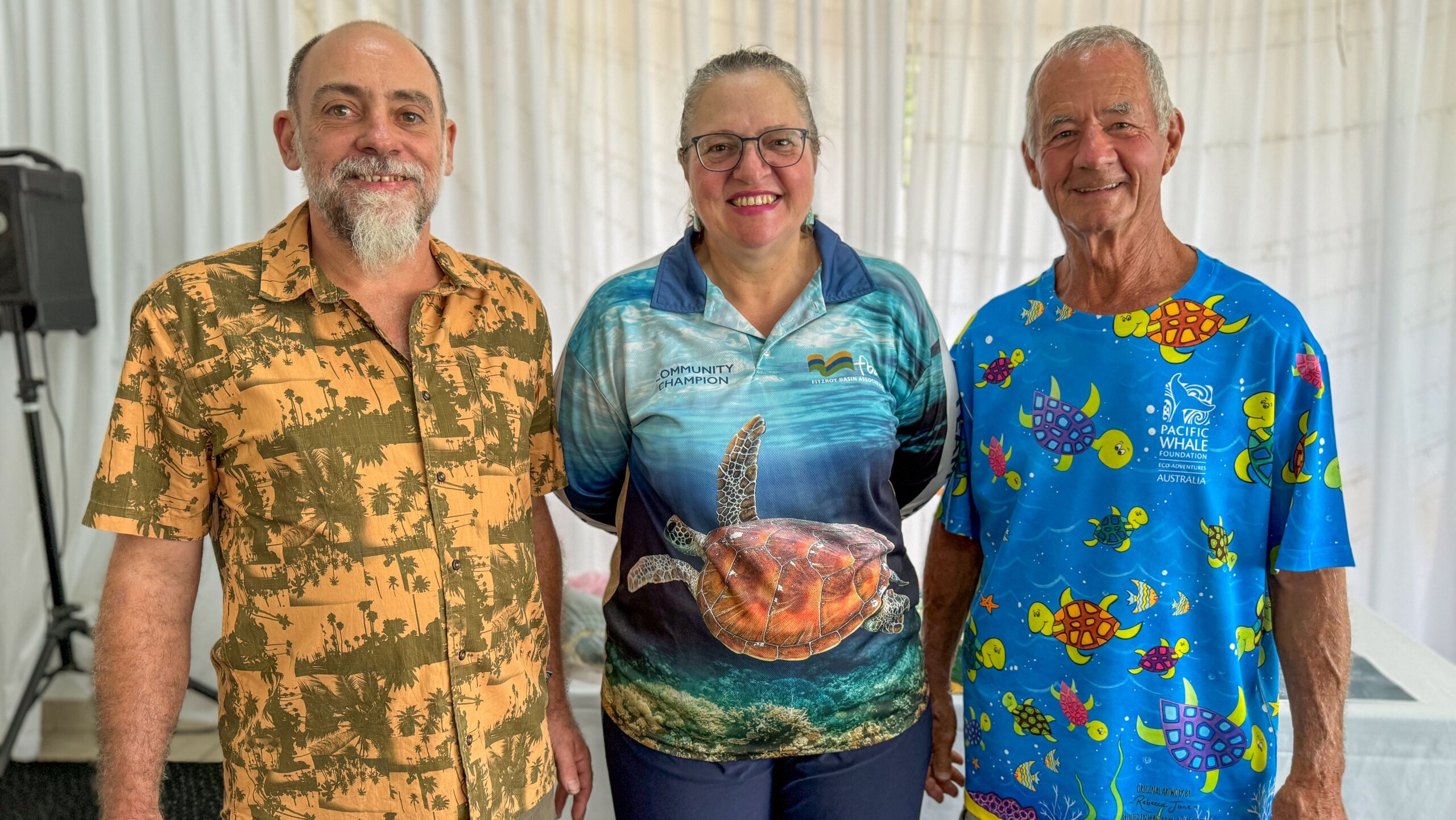 Three FBA Team Turtle CQ members smiling at the camera