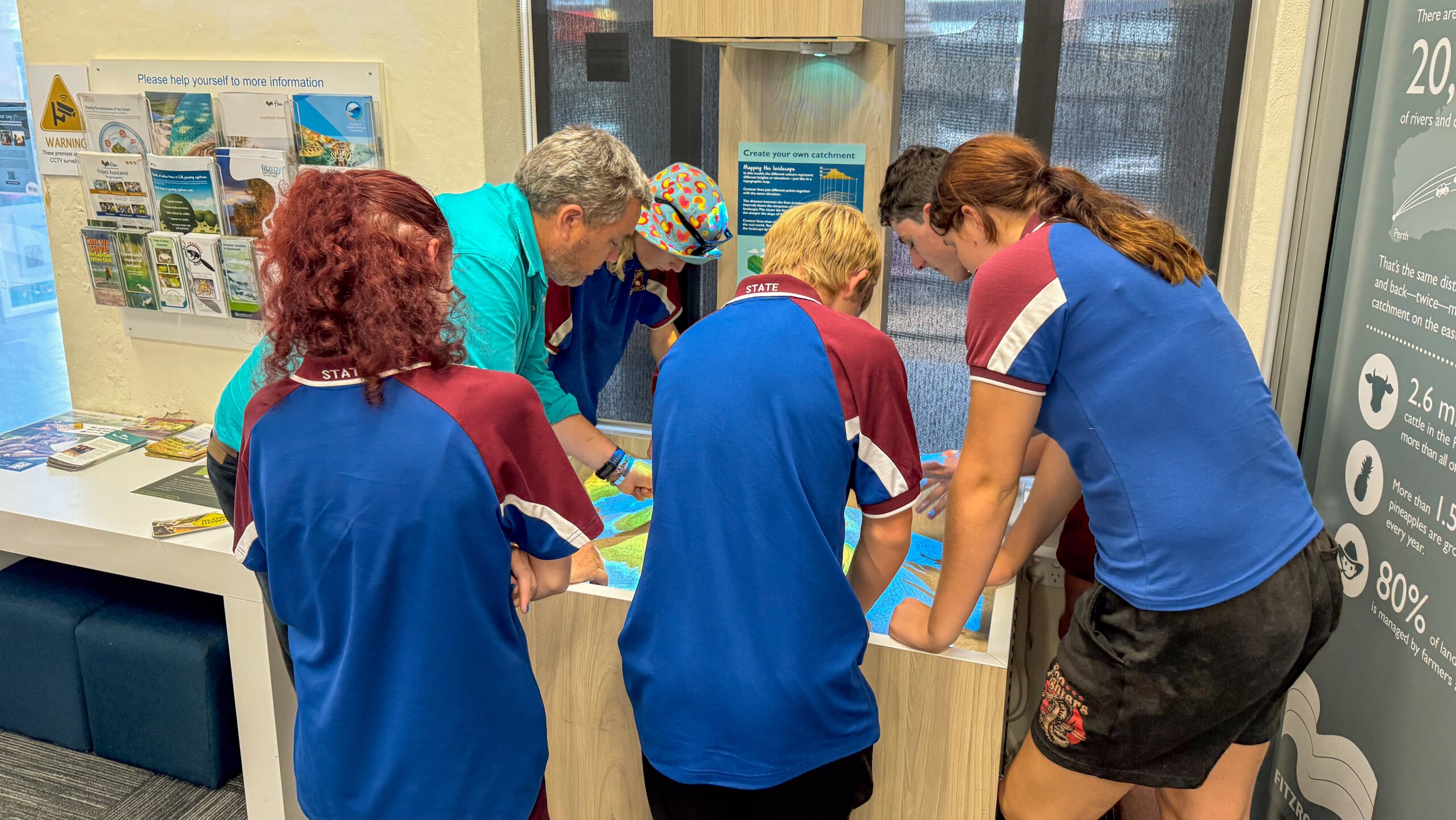A group of students looking at a map