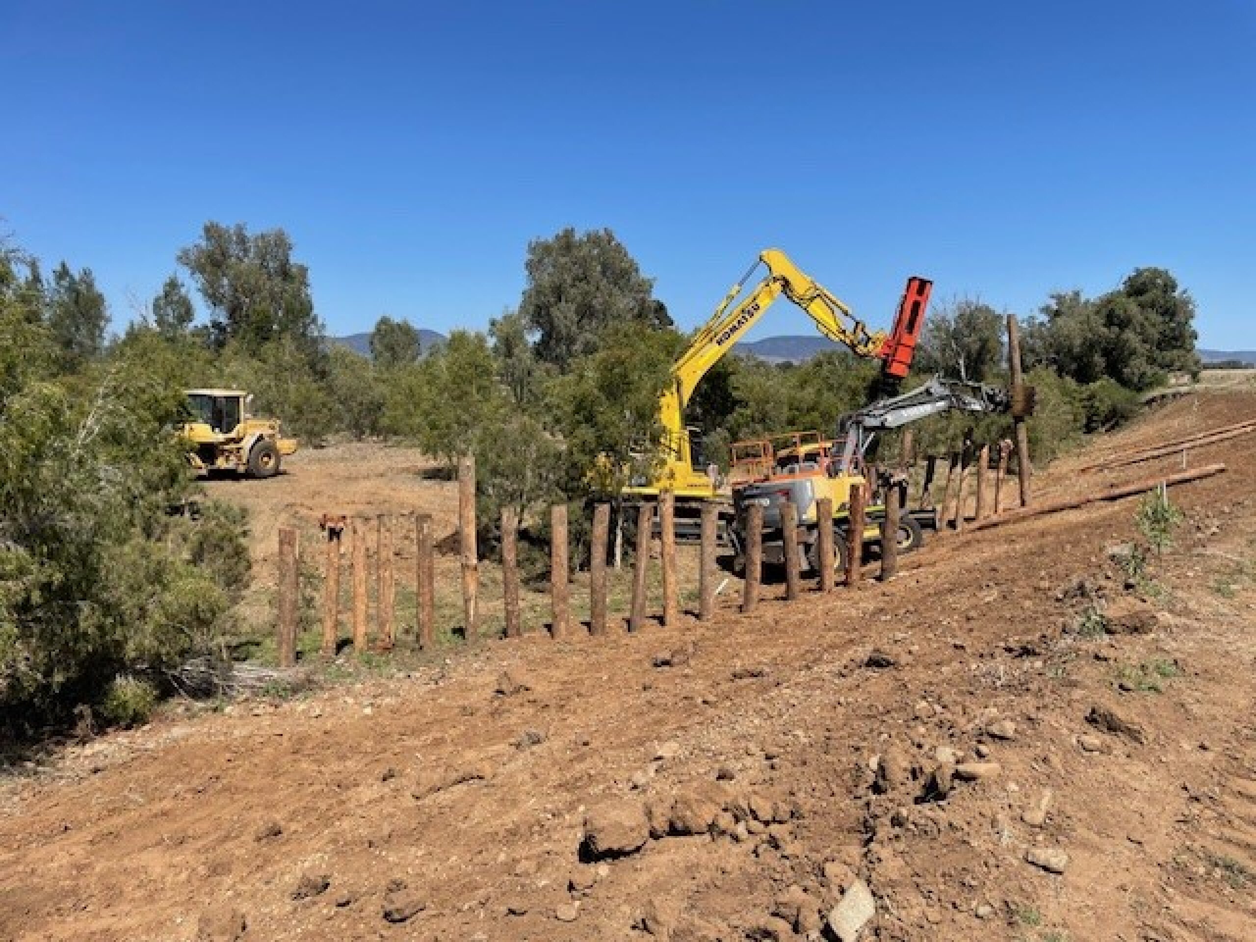 Banks being battered and pile fields installed at Six Mile 2023