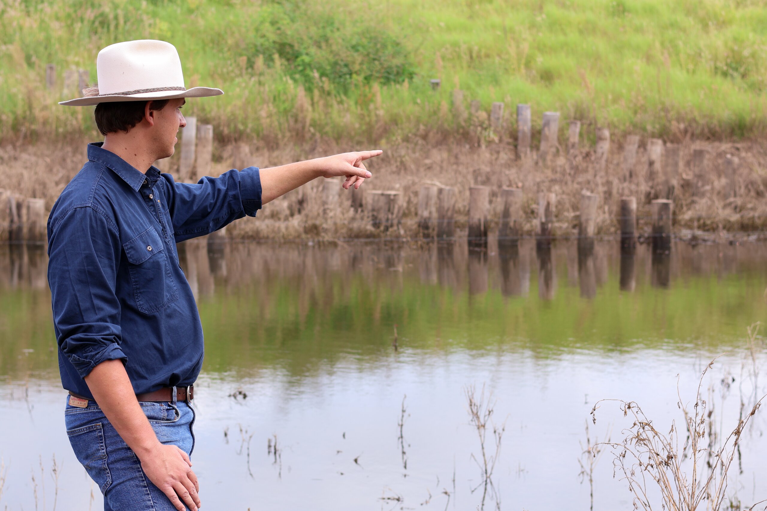 FBA Project Officer inspecting a streambank