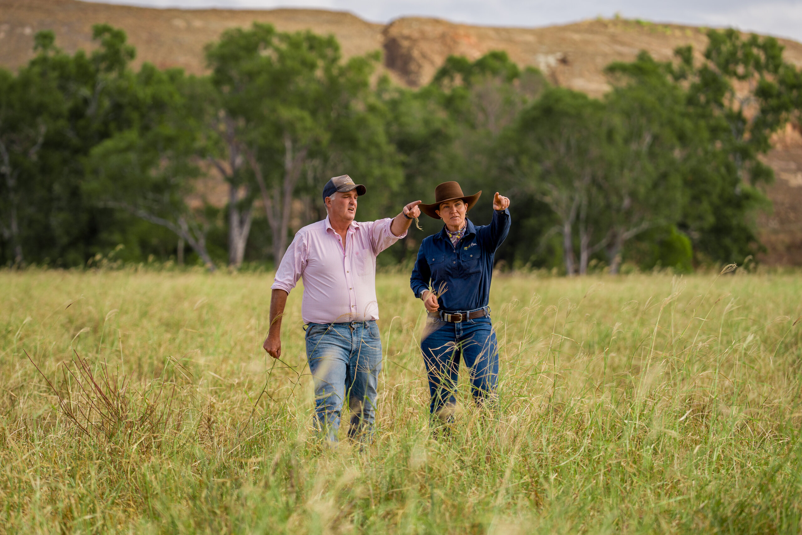 FBA Land Management Officer and land manager standing in a field