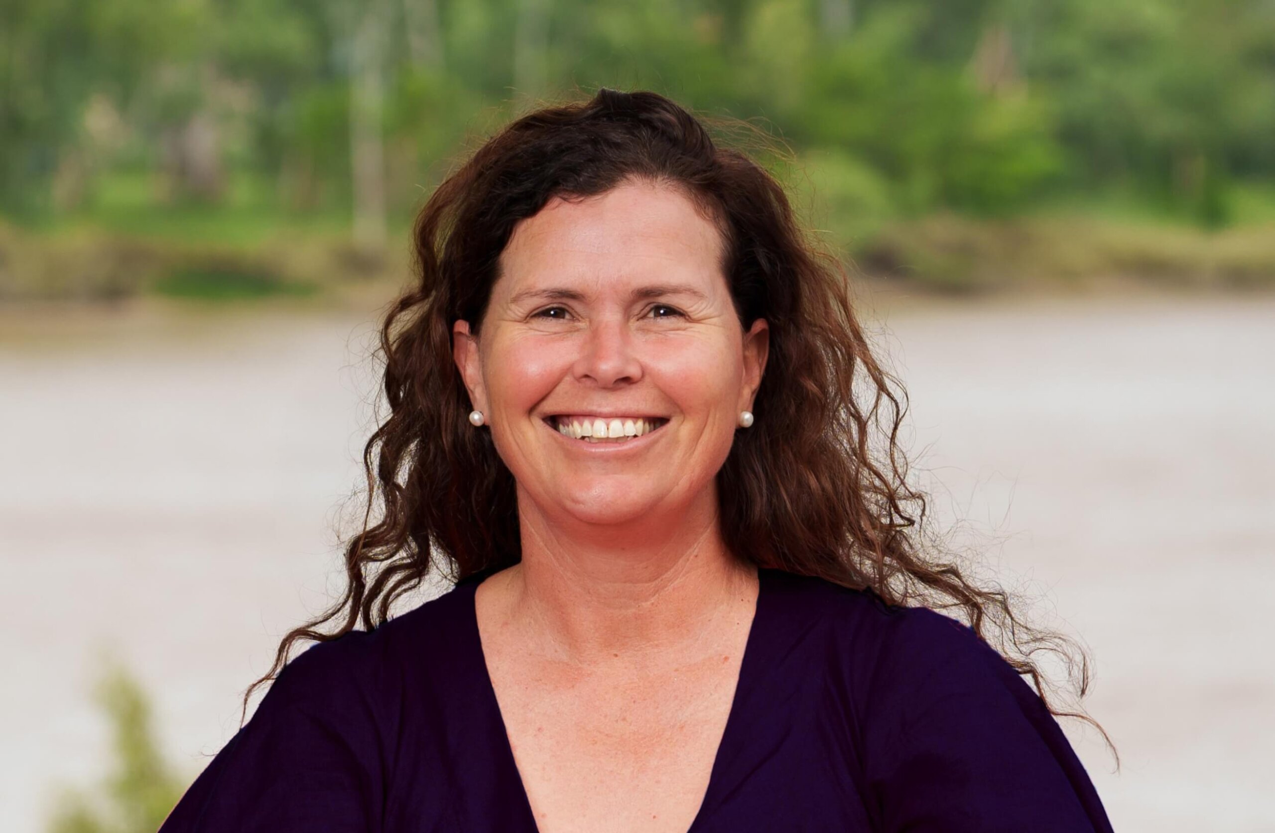 Megan Daniels smiles at the camera.